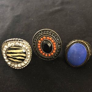 3 rings and a silver handmade bracelet